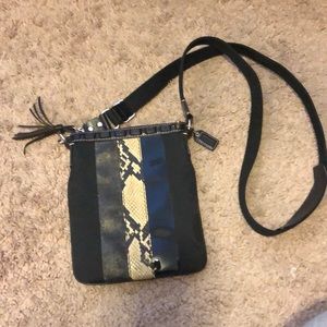 Tassel coach crossbody bag. Like new. Hardly worn